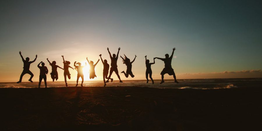 team enjoying beach activity